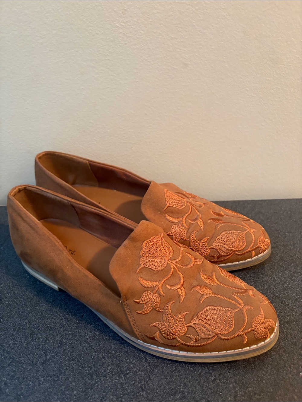 Indigo Embroidered Suede Slip-Ons in Burnt Orange